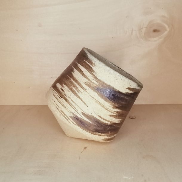 Tazza da te inclinata, dondolante
