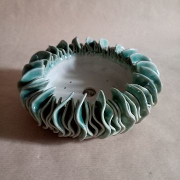Vaso bonsai rotondo che ricorda un anemone marino in gres smaltato turchese