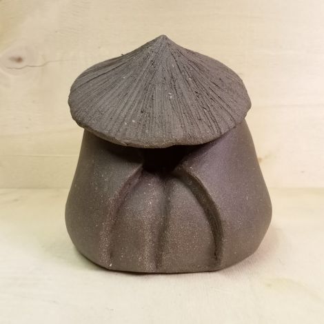 Statua pellegrino addormentato